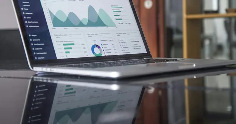 Laptop screen showing an analytics dashboard
