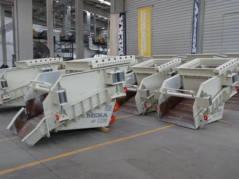 Industrial machines lined up on a factory floor